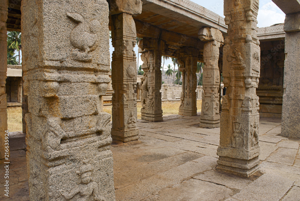 Carved pillars of at the entrance of the maha-mandapa, Achyuta Raya temple, Hampi, Karnataka. Sacred Center