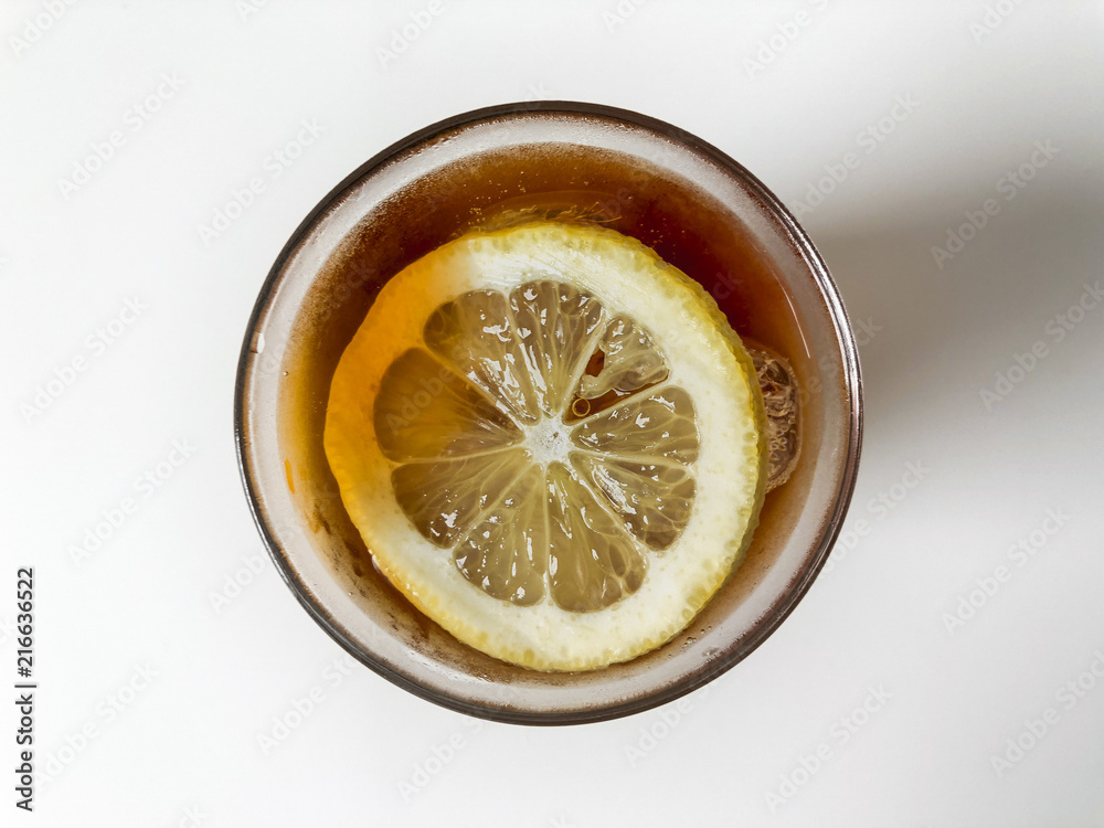 Iced pouring light roasted coffee, topped with lemon. Iced pouring light roasted coffee, topped with lemon.