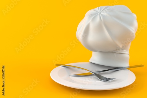 Fototapeta Naklejka Na Ścianę i Meble -  Chef's hat with empty plate
