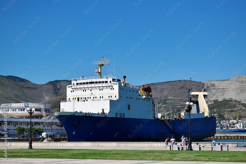 Novorossiysk, Russia - July 3, 2018: Cargo and passenger ship moored in the sea port Novorossiysk, Russia - July 3, 2018: Cargo and passenger ship moored in the sea port