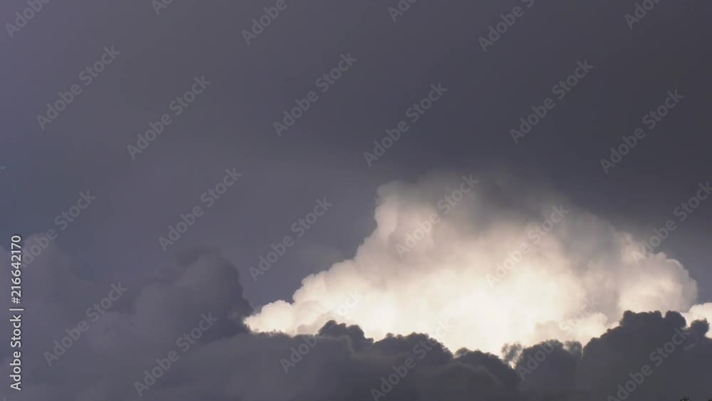 dense rain clouds and a rainbow dense rain clouds and a rainbow