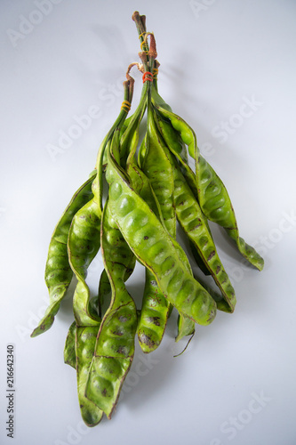 stink bean , bitter bean , parkia speciosa ( petai ), twisted cluster bean southern food of asian Thailand . smelly good vegetable herb photo