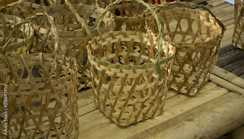 bambo basket collection on top of bamboo table photo