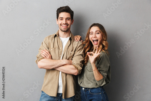 Portrait of a cheerful young couple standing together