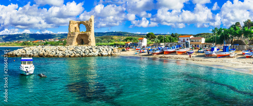 Traditional fishing village Briatico in Calabria with turquoise sea and old saracen tower. Italy