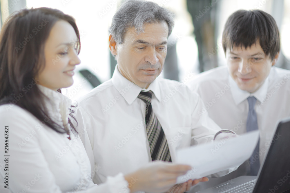 closeup.business team discussing a new contract. closeup.business team discussing a new contract.