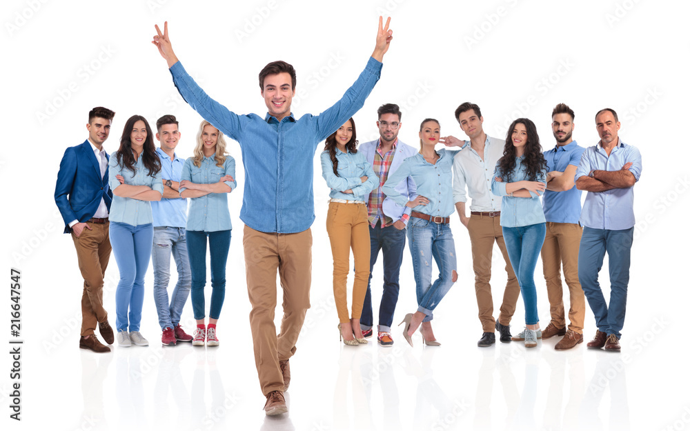 Fototapeta premium young team leader celebrating success of group whil walking forward