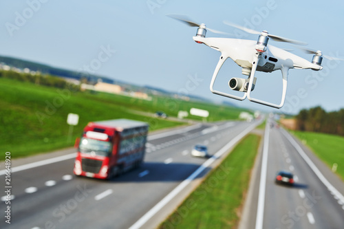 drone and transportation. drone with camera controls highway road conditions © Kadmy