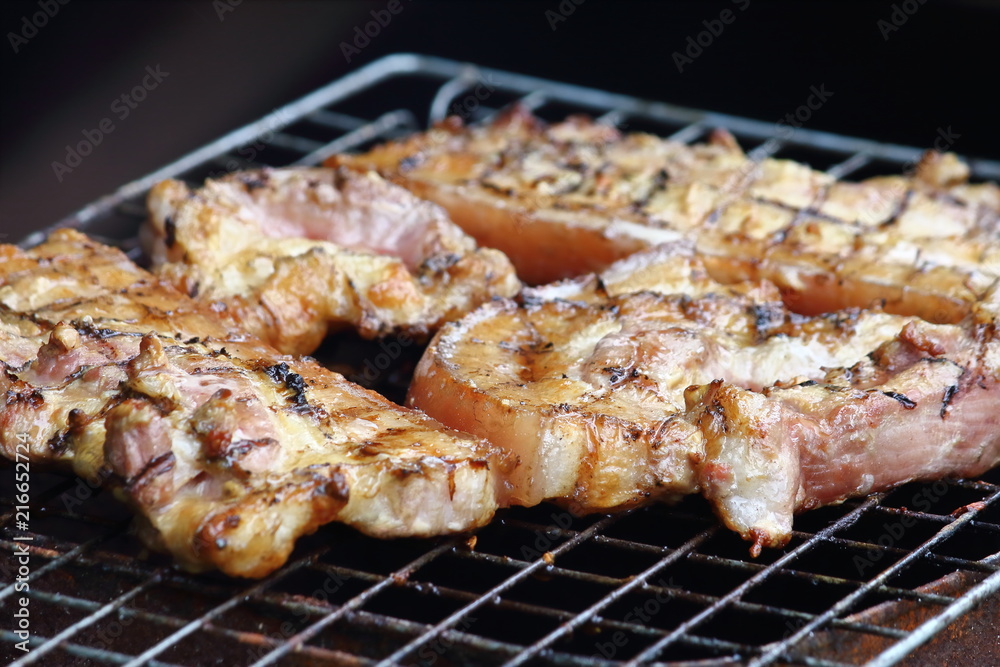 delicious food pork grilling on hot charcoal