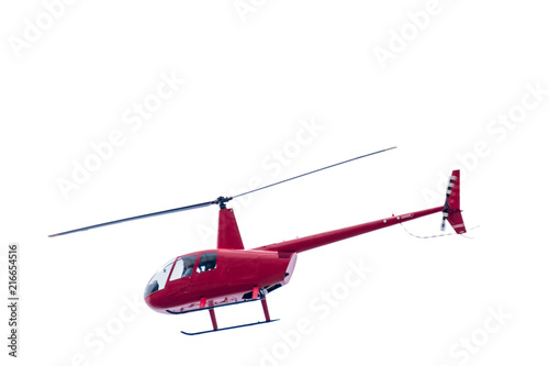Freigestellter roter Hubschrauber auf weißem Hintergrund