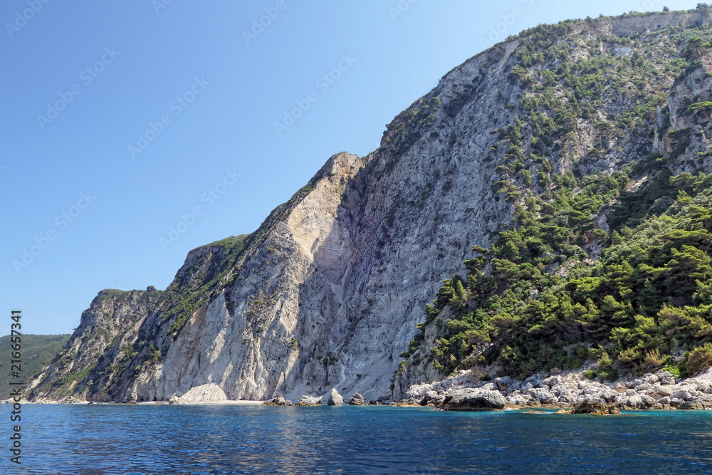 paradise beach part names Chomi Beach of Liapades at Corfu Island (Greece). Sedimentary rock cliff of chalk rocks