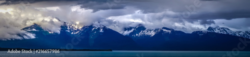 beautiful sunset and cloudsy landscape in alaska mountains photo