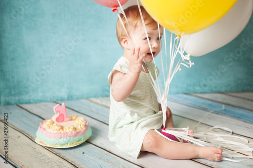 Wall Mural First birthday party. Cute little girl