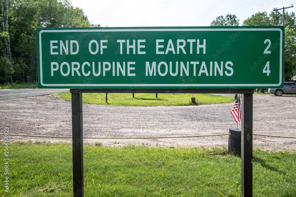 Funny Highway Road Signs. Mile marker for Porcupine Mountains State Park in the Upper Peninsula of Michigan.  The park is located in one of the largest wilderness tracts in the American Midwest.