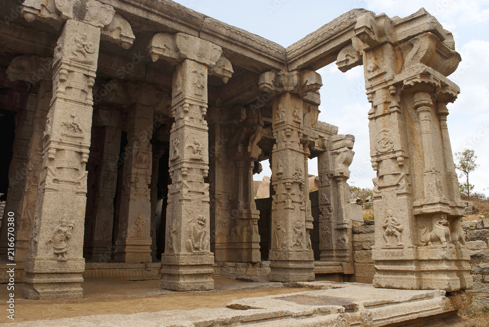 Carved pillars of the Kalyana Mandapa, Divine Marriage Hall, Achyuta Raya temple, Hampi, Karnataka, India. Sacred Center. General view from the south.