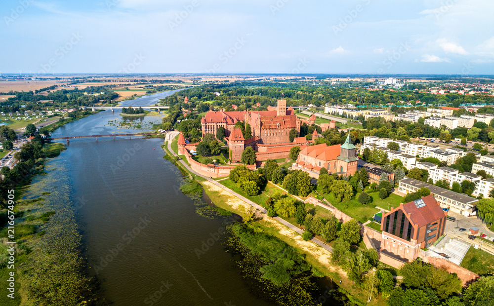 Malbork Castle on the bank of the Nogat River. UNESCO world heritage in Poland