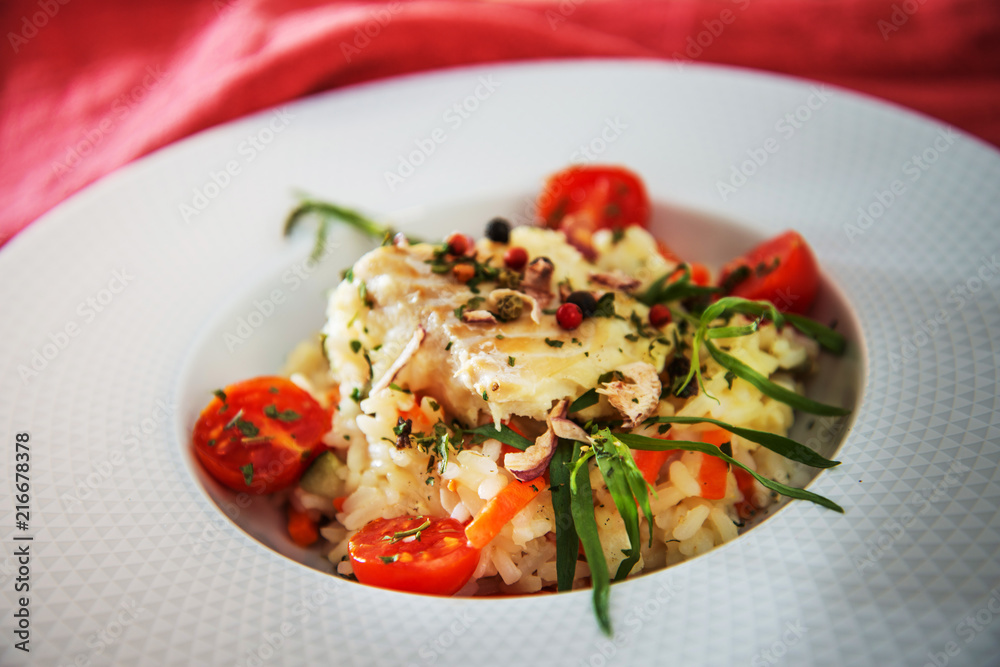 Andalusian fish, saffron rice with vegetables