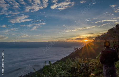 Scenic natural sunlight, sunrise orange, white mist flowed beautifully. Doi Tule at Tak in Thailand.