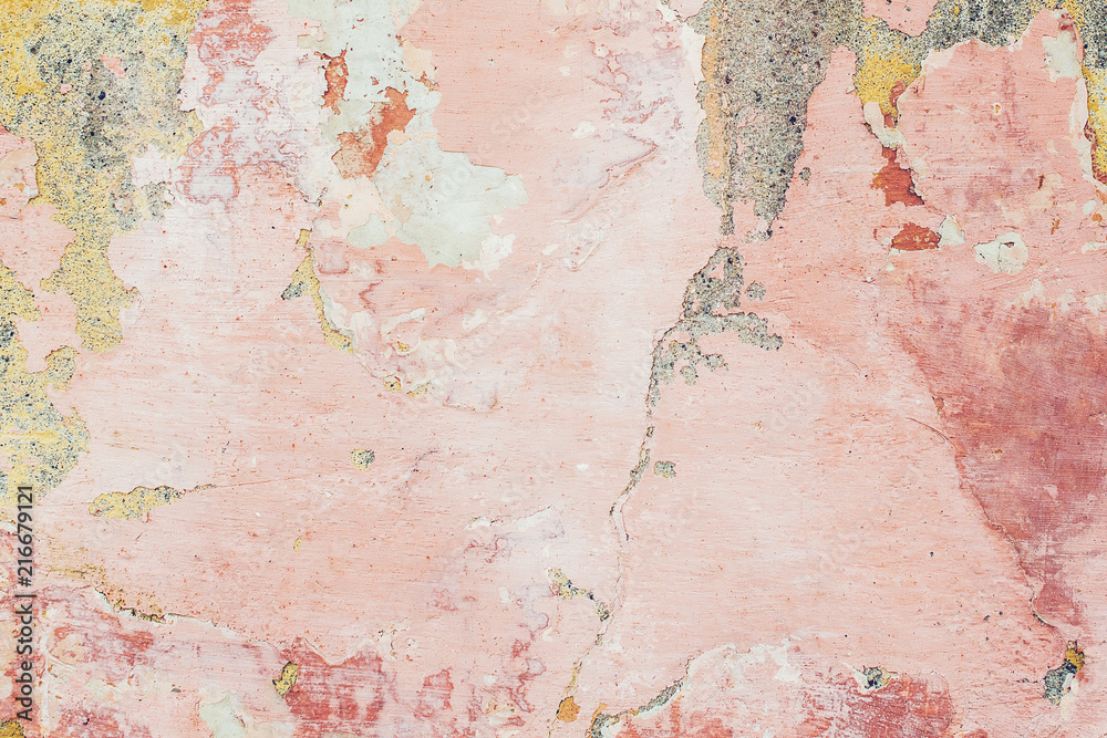 Old colored cracked wall. Grunge wall texture for design. Colored cracked background. Old paint texture is chipping and cracked fall destruction. Background of old pink painted wall. - obrazy, fototapety, plakaty 