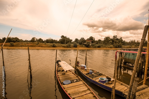 Fototapeta Naklejka Na Ścianę i Meble -  Thailand traditional boat on the canal river, old sepia retro style