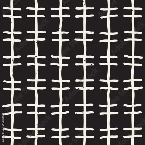 Hand drawn lines seamless grungy pattern. Abstract geometric repeating texture in black and white.