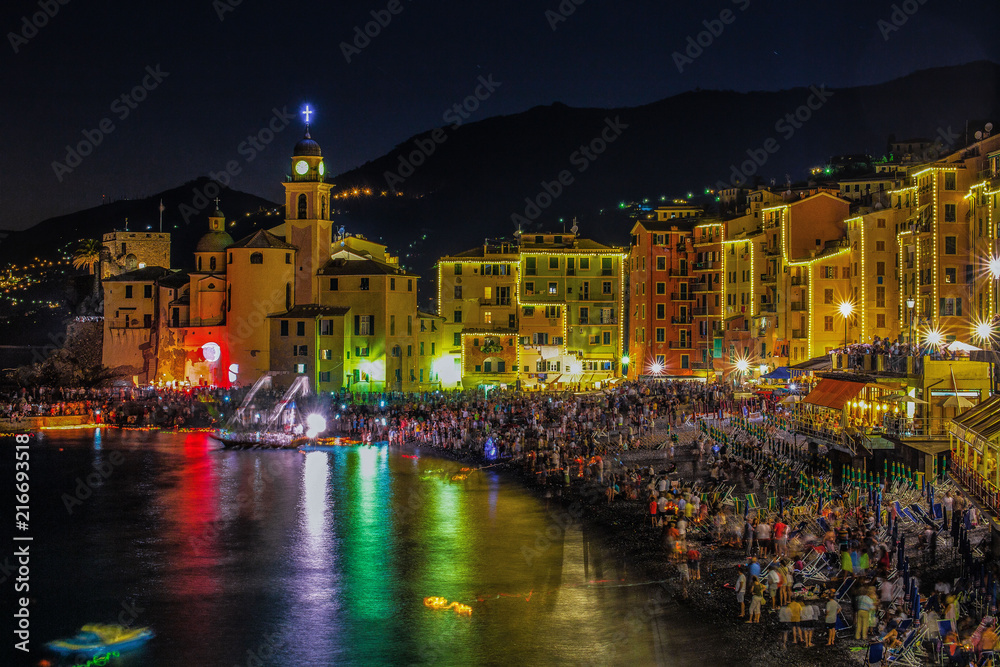 Stella Maris traditional celebration. During the night when thousands of tiny lit candles are left on the water from the boats or from the beach in Camogli, Genoa (Genova) province, Italy.