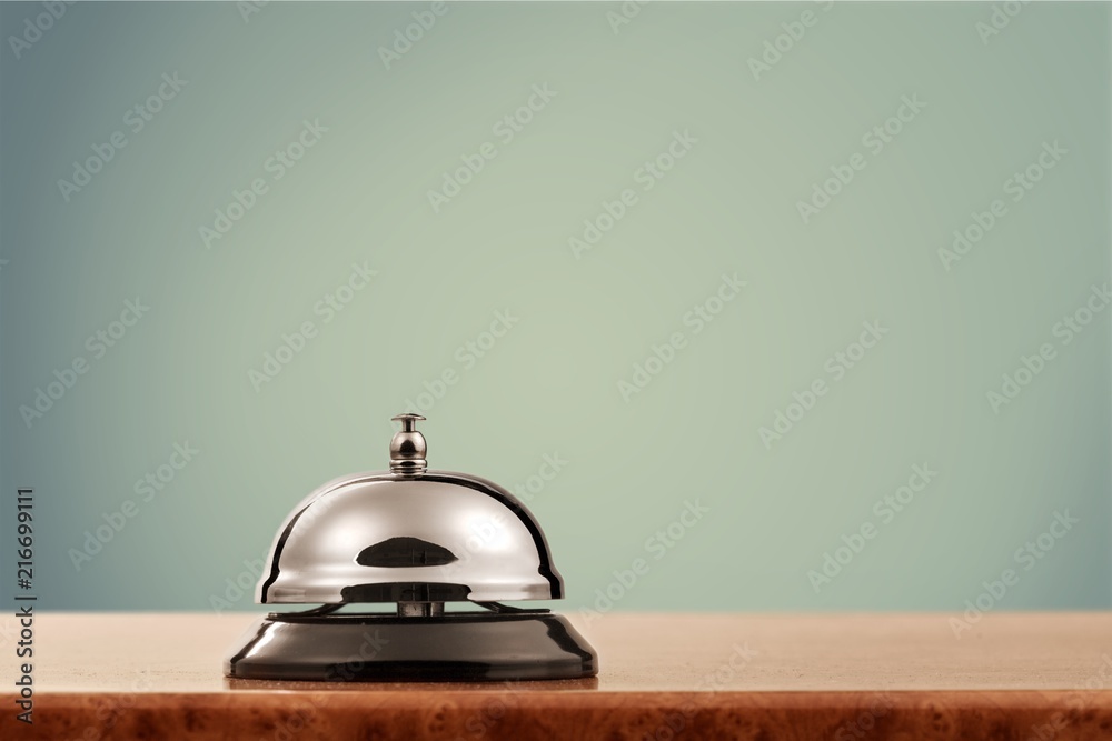 Obraz premium Vintage hotel reception service desk bell