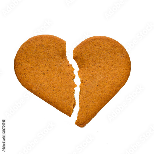 Gingerbread cookies in the form of broken heart, isolated on a white background.