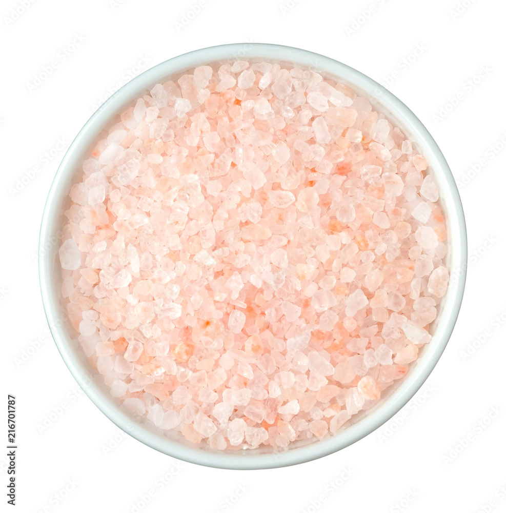 Himalayan pink salt in white bowl on white isolated background. Top view. Himalayan pink salt in white bowl on white isolated background. Top view.