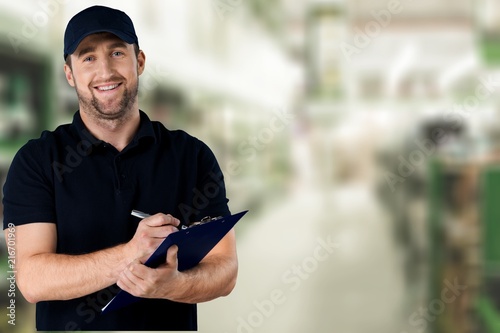 Delivery man with clipboard