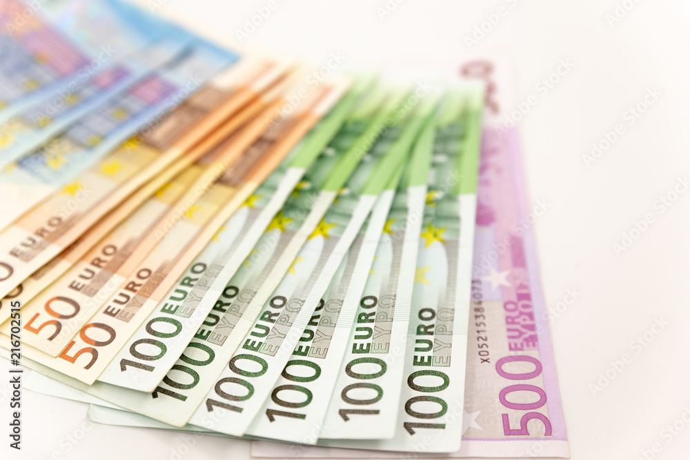 Spread Stack of Euro Banknotes, isolated close-up on white background Spread Stack of Euro Banknotes, isolated close-up on white background
