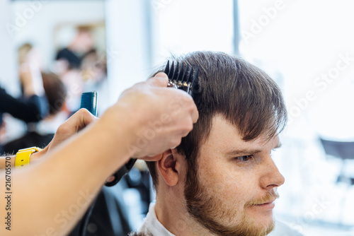 man at professional barbershop