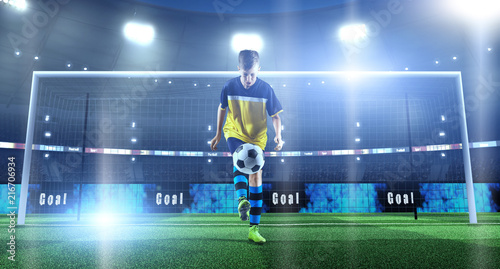 Young soccer player with ball in front of the goal on a professional 3D stadium