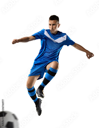 Young soccer player isolated on the white background with soccer ball 