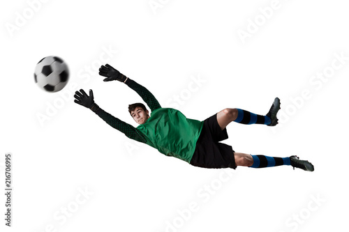 Young soccer goalkeeper isolated on the white background with soccer ball