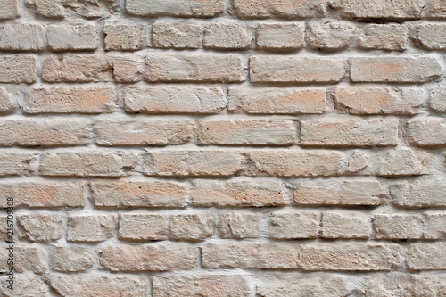 Brick wall painted in pastel color as background, texture