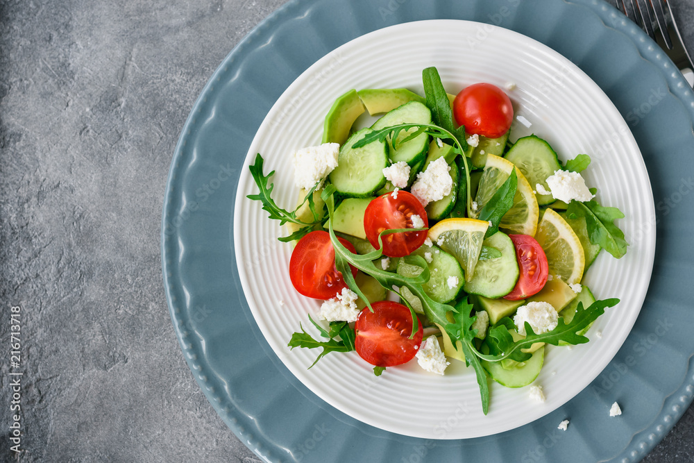 Salad with vegetables and cheese.