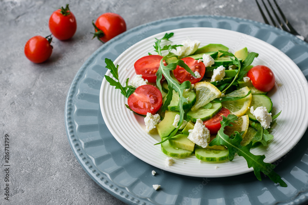 Salad with vegetables and cheese.