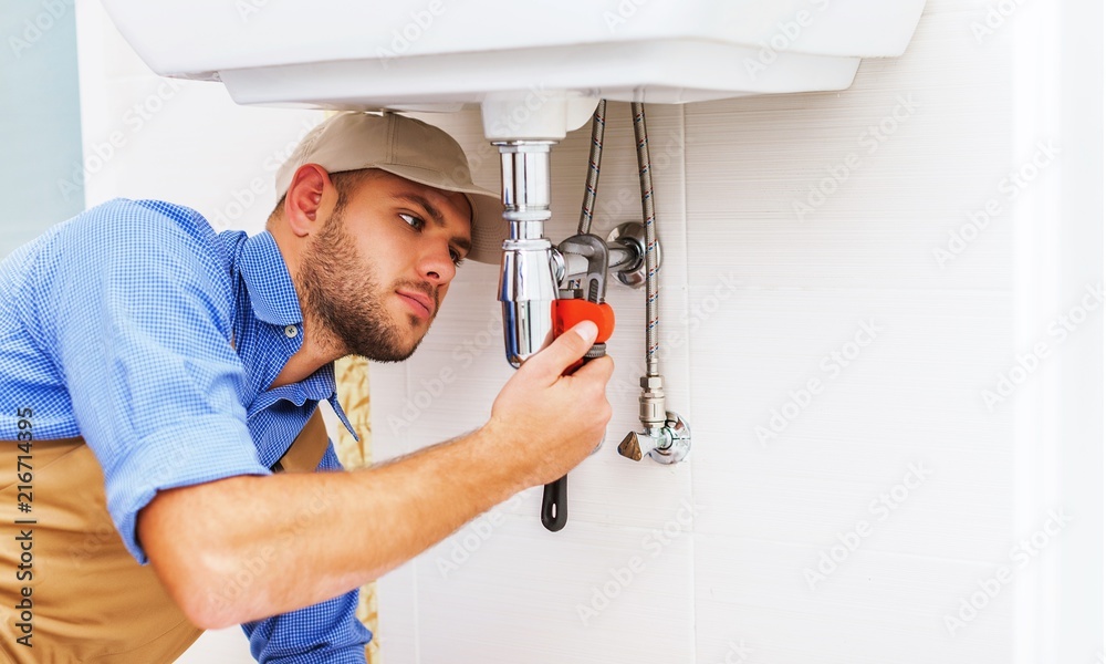 Man at work uniform with tools Man at work uniform with tools