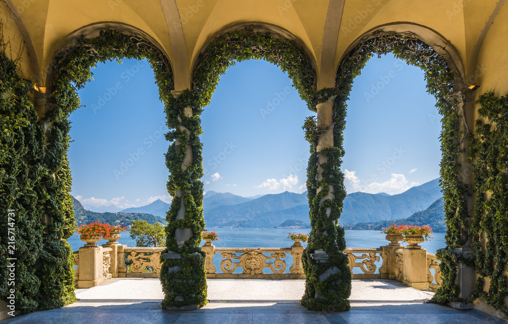 Scenic balcony overlooking Lake Como in the famous Villa del Balbianello, in the comune of Lenno. Lombardy, Italy. - obrazy, fototapety, plakaty 
