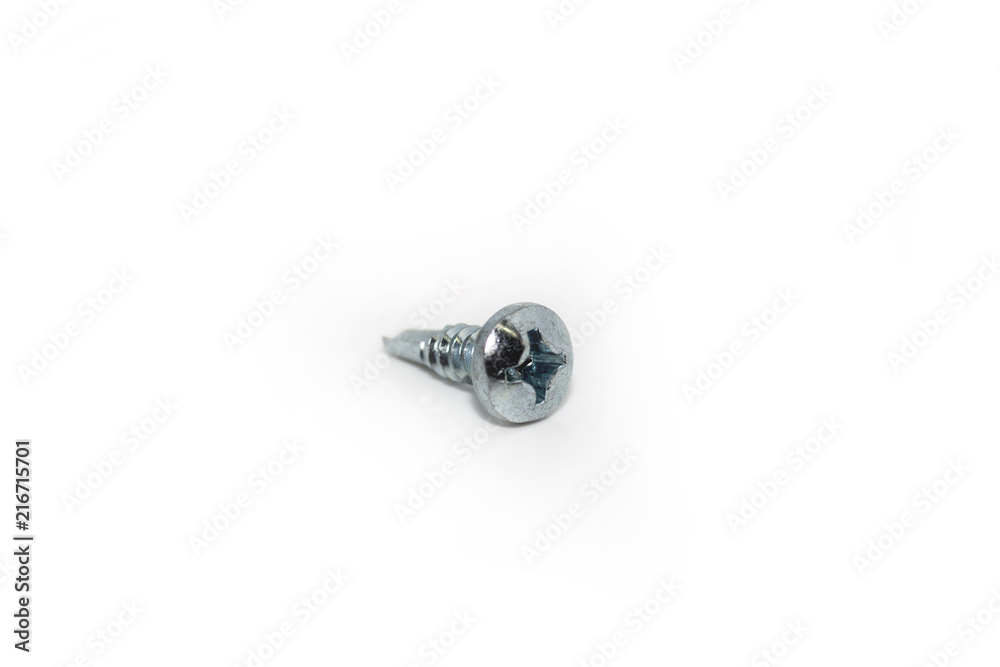 Single self drilling metal steel chrome screw isolated on white background Single self drilling metal steel chrome screw isolated on white background