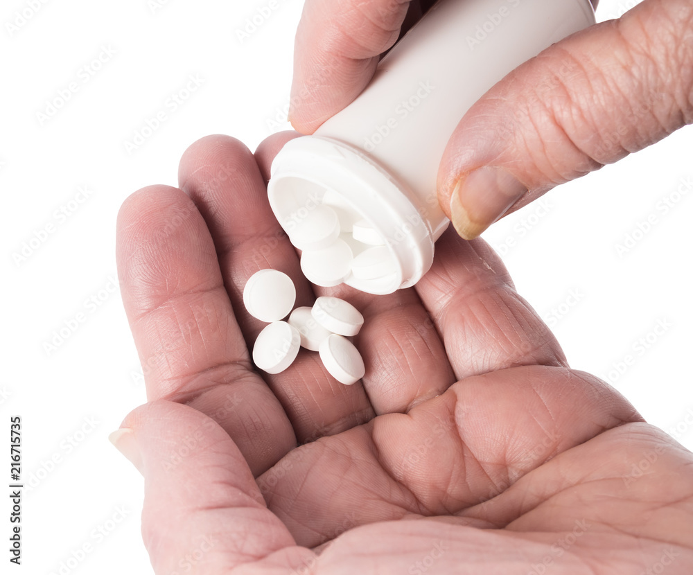 Female palm with pills isolated on white background Female palm with pills isolated on white background