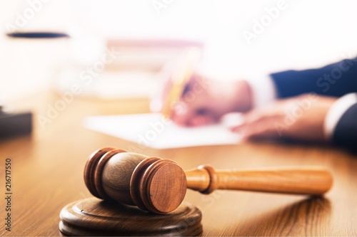 Gavel with Lawyer Writing photo