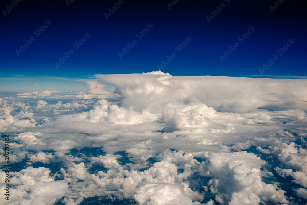 Naklejka premium beautiful clouds view from the window of an airplane