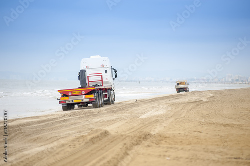 Lavoro di ripascimento della spiaggia di Rimini photo