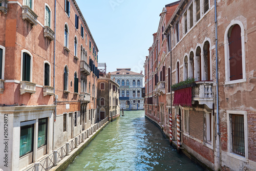 Scenic canal with colorful ancient buildings in Venice, Italy. Sommer. © Trambitski