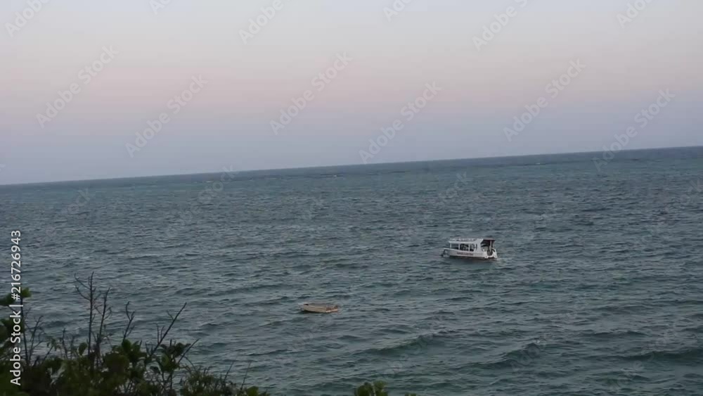 Time-lapse of a boat in the sea in Kenya Time-lapse of a boat in the sea in Kenya