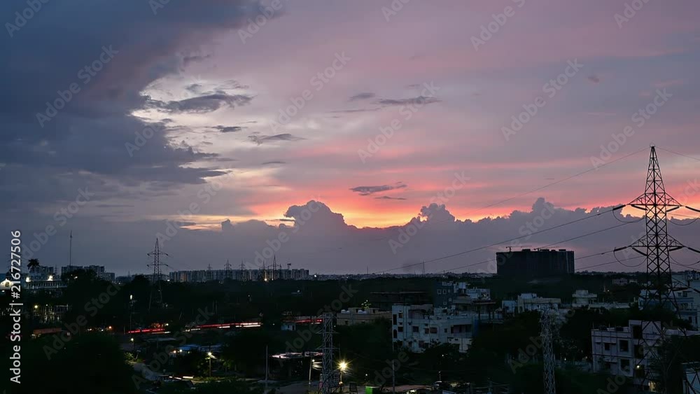 Timelapse of a beautiful colorful Sunset and a view of a cityscape in India from rooftop Timelapse of a beautiful colorful Sunset and a view of a cityscape in India from rooftop