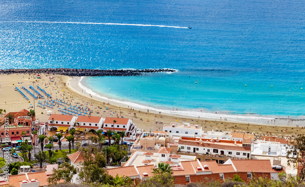 Fuente playa de Las Vistas in summer holiday, Tenerife island - Spain Stock  Photo | Adobe Stock