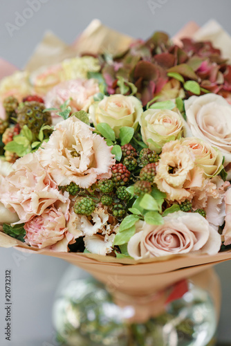 Floral Arrangement. Mix flowers. Beautiful summer bouquet. Concept of a flower shop. Profession florist